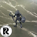 A dnd miniature kuo-toa whip primed in black.
