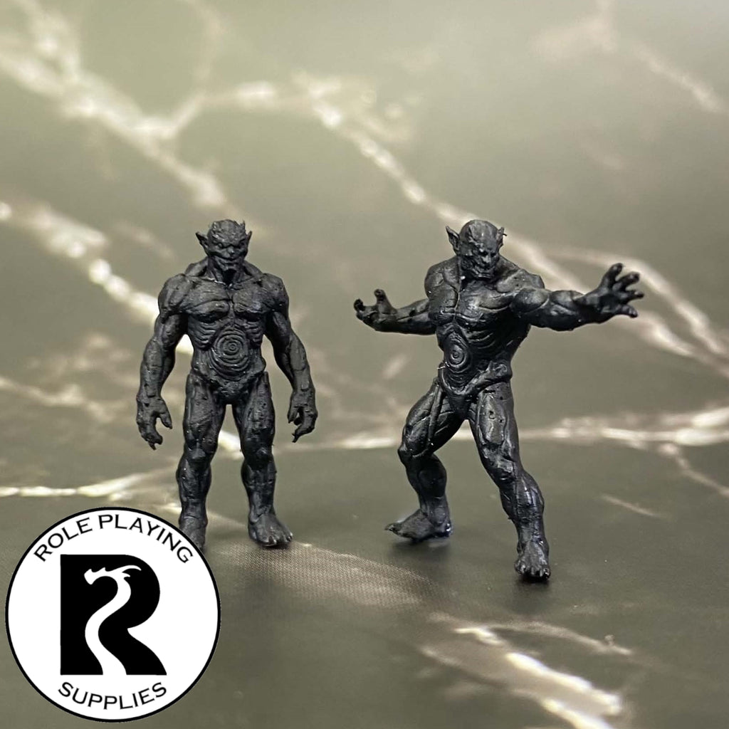 A dnd miniature magmin primed in black.
