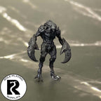 A dnd miniature meenlock primed in black.
