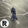 A dnd miniature mind flayer arcanist primed in black.
