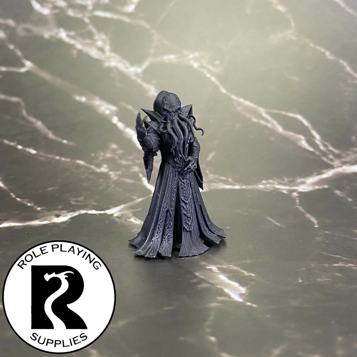 A dnd miniature mind flayer arcanist primed in black.
