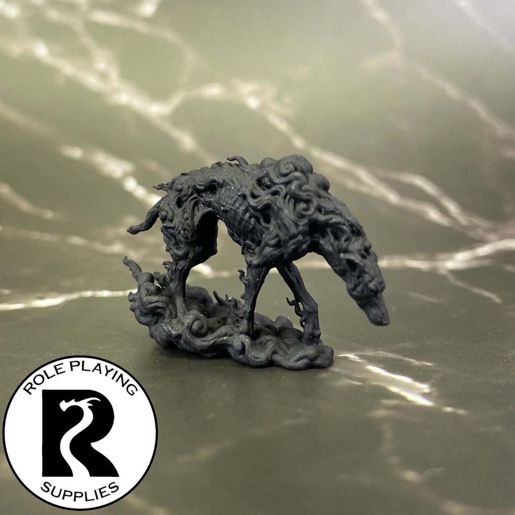A dnd miniature mist hound primed in black.
