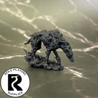 A dnd miniature mist hound primed in black.
