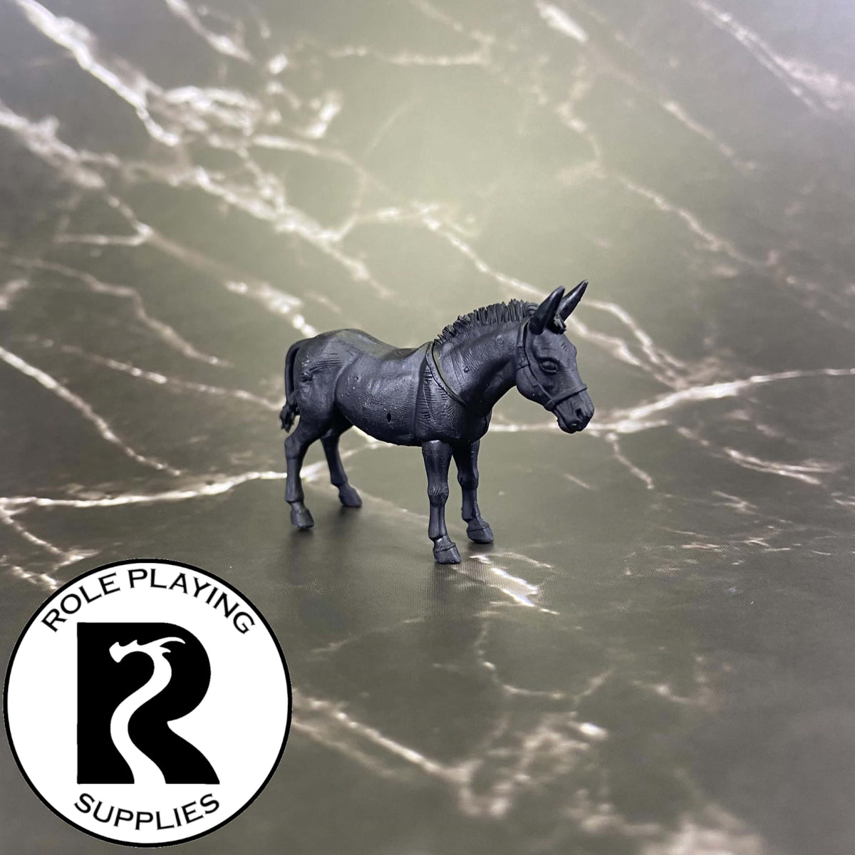 A dnd miniature mule primed in black.
