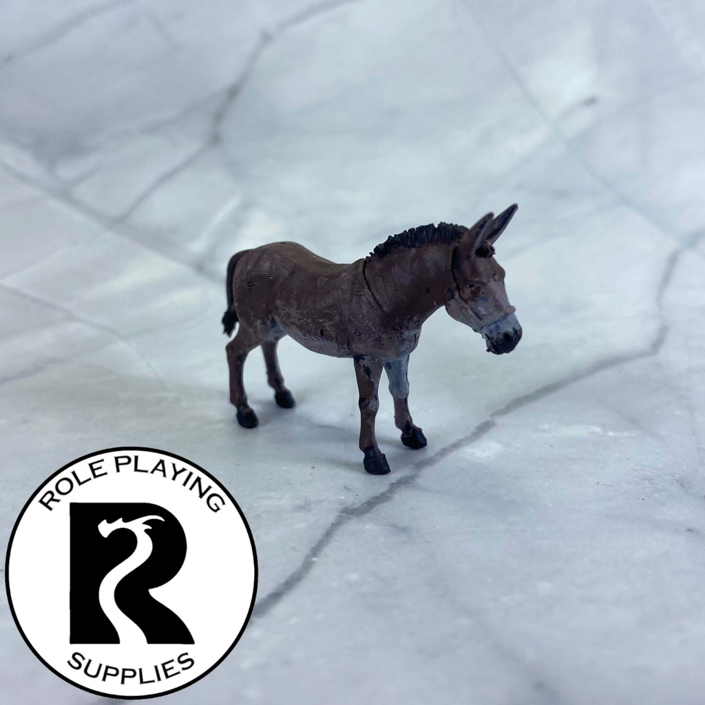 A dnd miniature mule painted.
