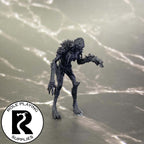 A dnd miniature needle blight primed in black.

