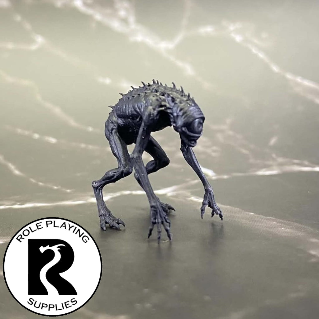 A dnd miniature nothic primed in black.
