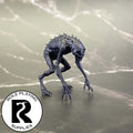 A dnd miniature nothic primed in black.
