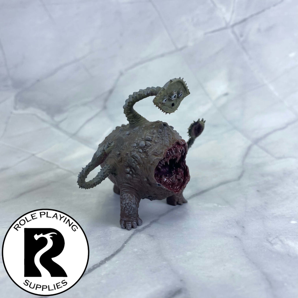 A dnd miniature otyugh painted.
