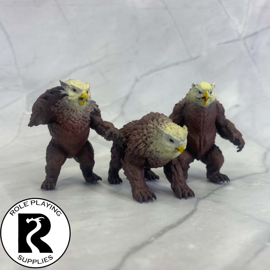 A dnd miniature owlbear painted.

