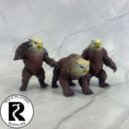 A dnd miniature owlbear painted.
