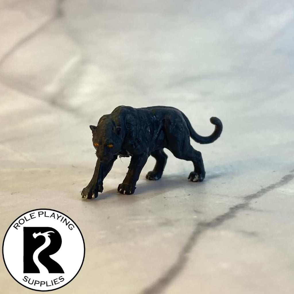 A dnd miniature panther painted.
