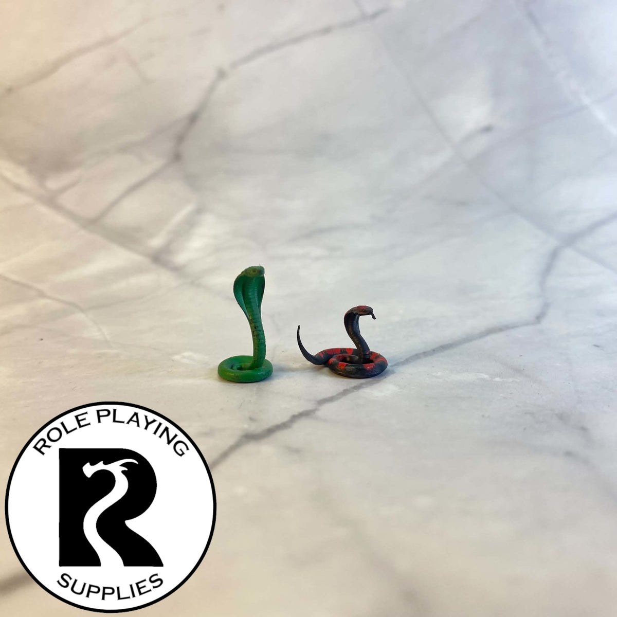 A dnd miniature poisonous snake painted.
