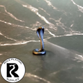 A dnd miniature poisonous snake primed in black.
