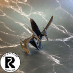 A dnd miniature pair of pteranodons primed in black.
