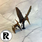 A dnd miniature pteranodon pair painted.
