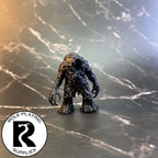 A dnd miniature shambling mound primed in black.
