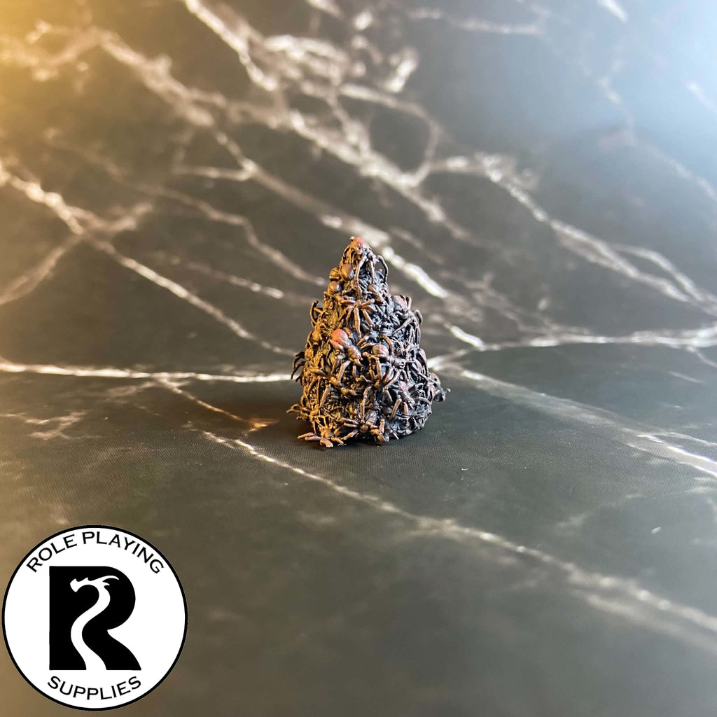 A dnd miniature of a swarm of spiders / insects.