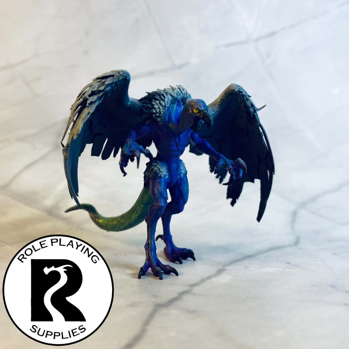 A dnd miniature vrock painted.
