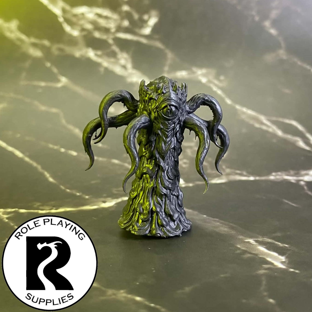 A dnd miniature yochlol primed in black.
